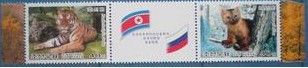 A2005朝鲜-05东北虎,貂等-2全(与俄罗斯联发,含2国国旗).jpg